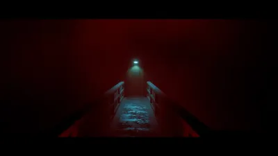 Interior of a red-lit trailer seen through an open door in Townfall